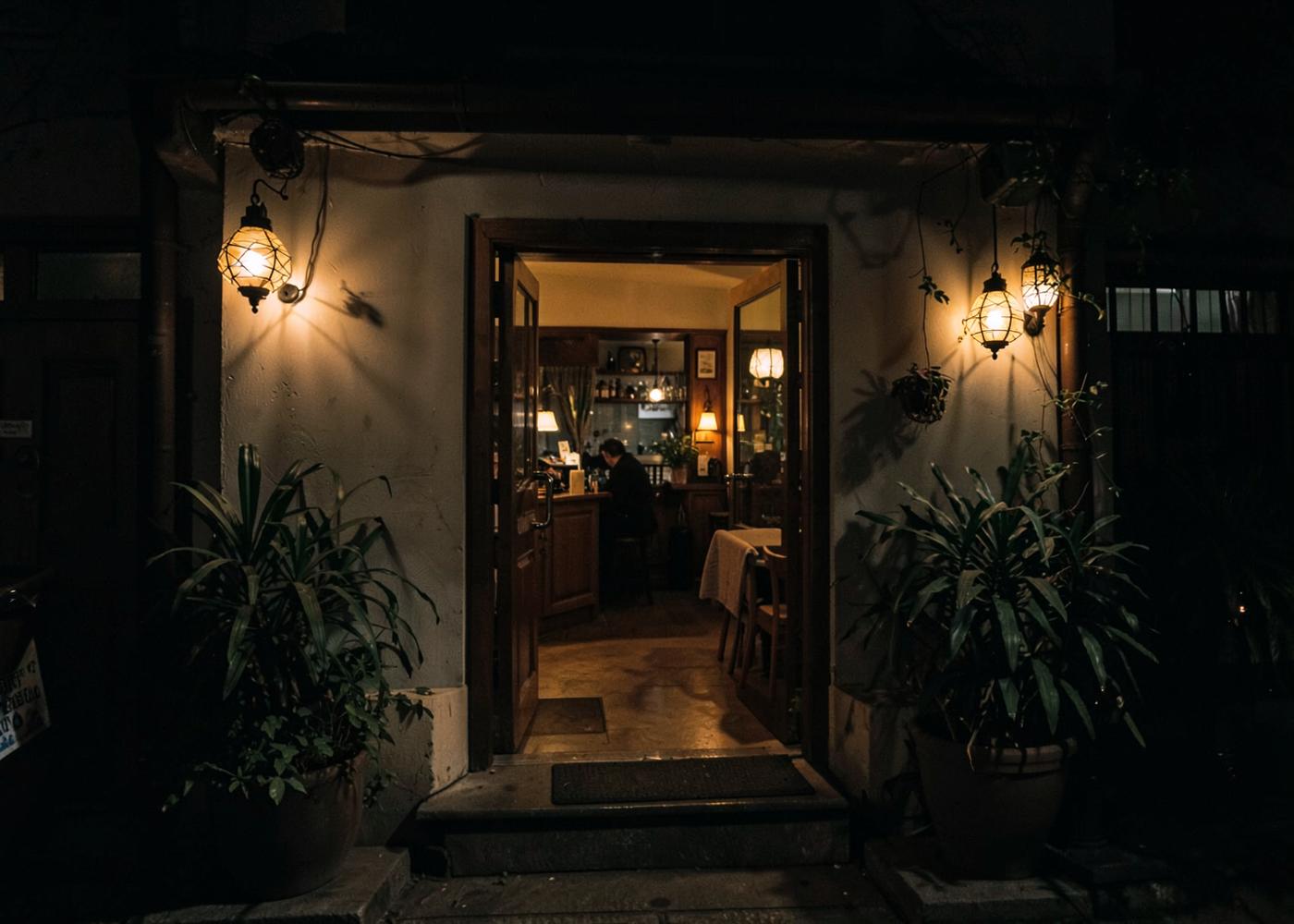 Colourful restaurant entrance at night